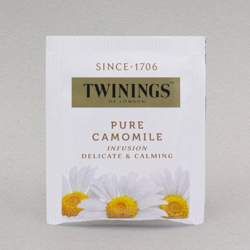 A single Twinings Pure Camomile tea bag in its packaging.