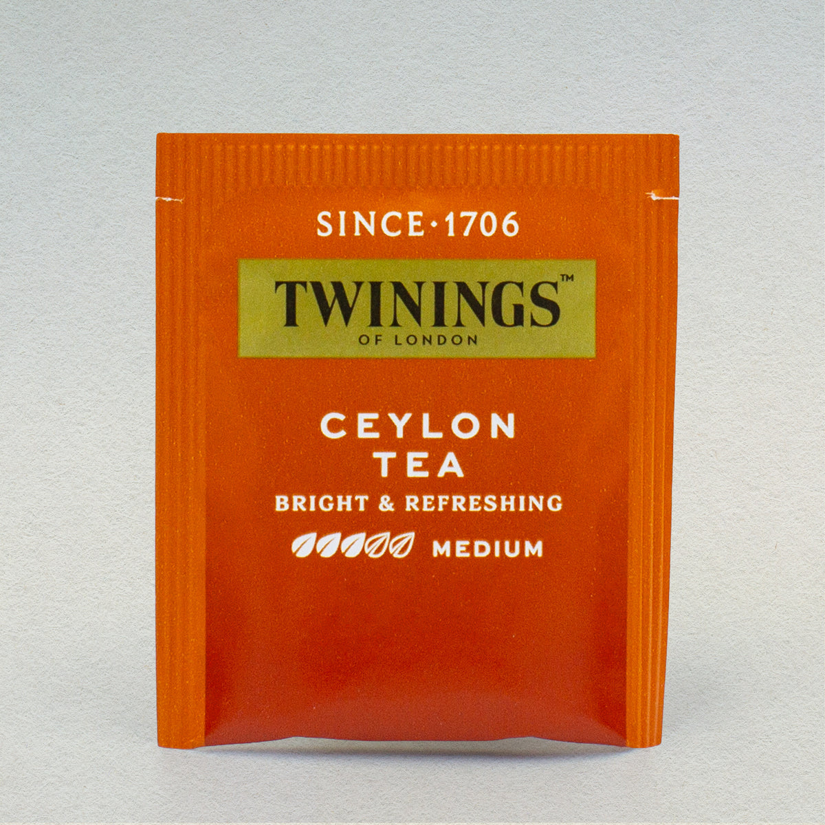 A single Twinings Ceylon tea bag in its packaging.