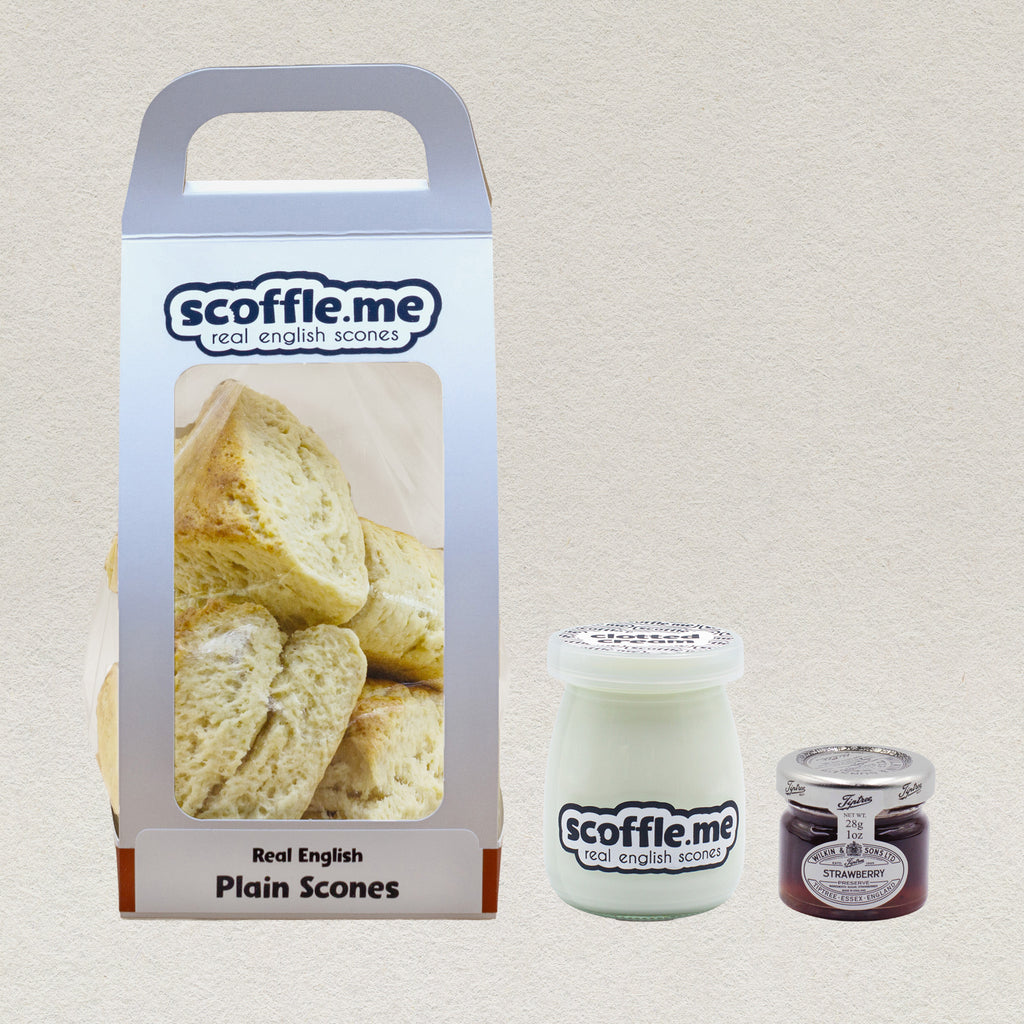 A bundle gift set containing a pack of Scoffle Me Real English Scones, a 100ml jar of clotted cream, and a 40g jar of real strawberry jam.