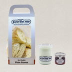A bundle gift set containing a pack of Scoffle Me Real English Scones, a 100ml jar of clotted cream, and a 40g jar of real strawberry jam.