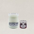 A 100ml glass jar of our homemade clotted cream and a 40g jar of real strawberry jam. 