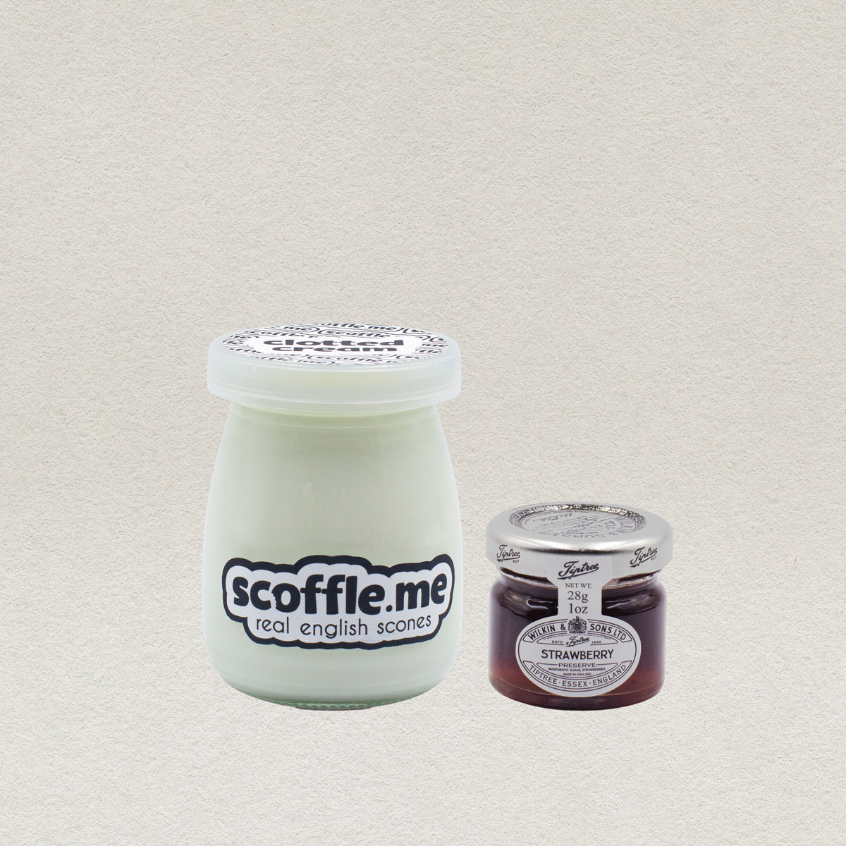 A 100ml glass jar of our homemade clotted cream and a 40g jar of real strawberry jam. 