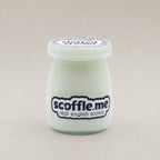 A retro looking 100ml glass jar of Scoffle Me branded homemade clotted cream.