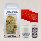 Scoffle Me's traditional cream tea set includes a bag of mixed scones, four bags of single serving Twining's English Breakfast Tea, two jars of strawberry jam and one jar of clotted cream. 
